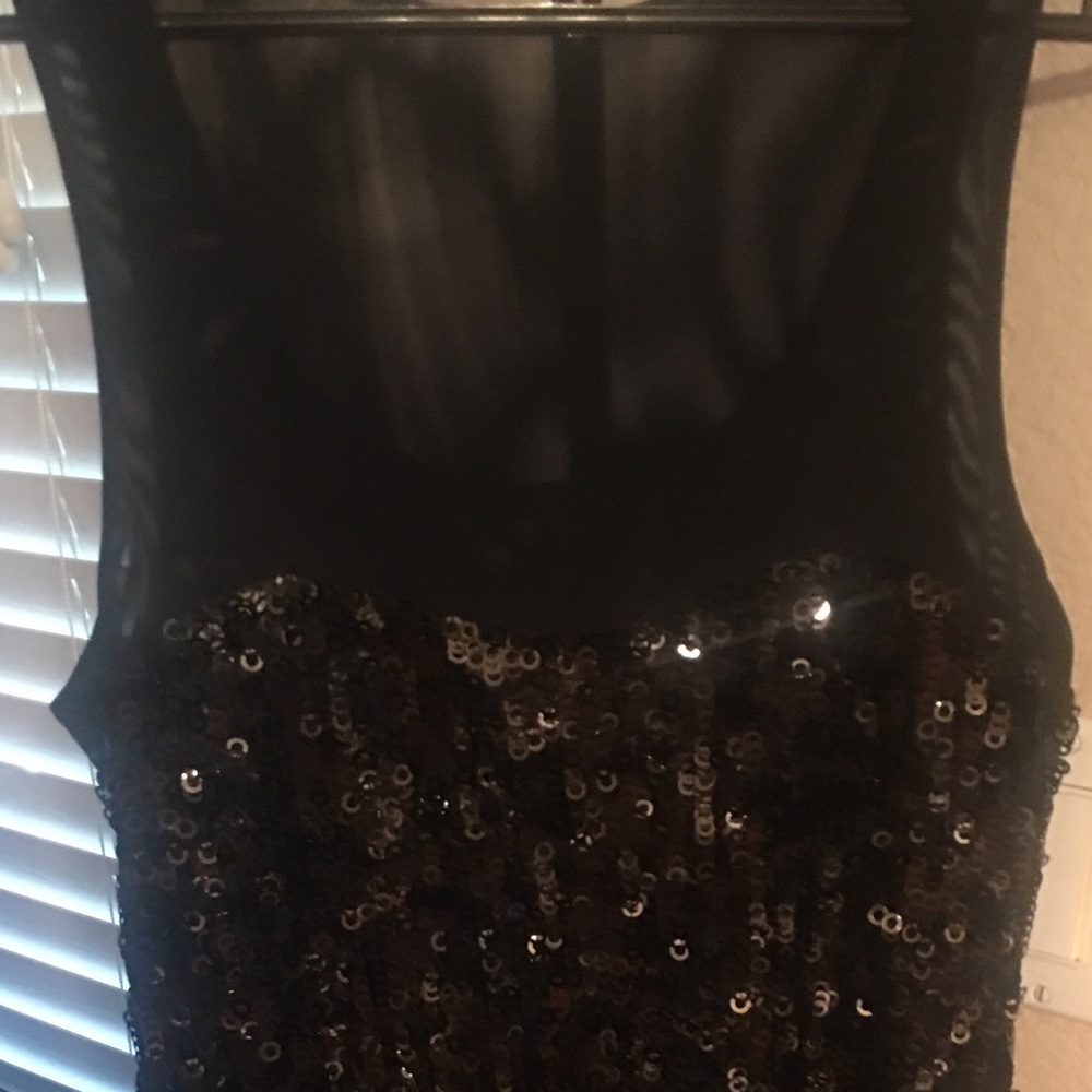 Sophisticated lil black Gown. HOT